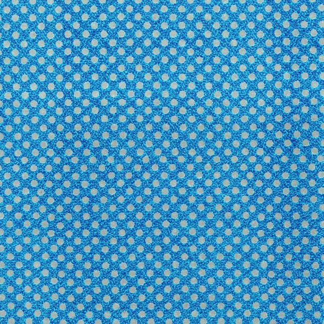 Gift wrapping paper mixed blue with silver dots on strong paper.
 