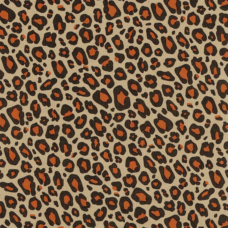 Gift paper with leopard print on ribbed brown kraft paper.
 