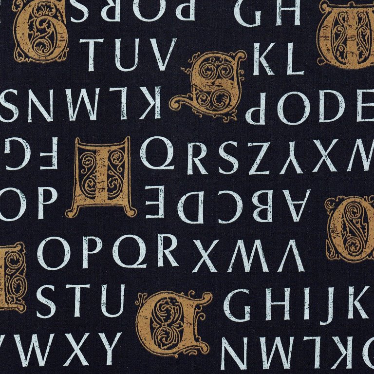 Cadeaupapier gotische letters goud en zilver met mat blauwe achtergrond op sterk papier.
 