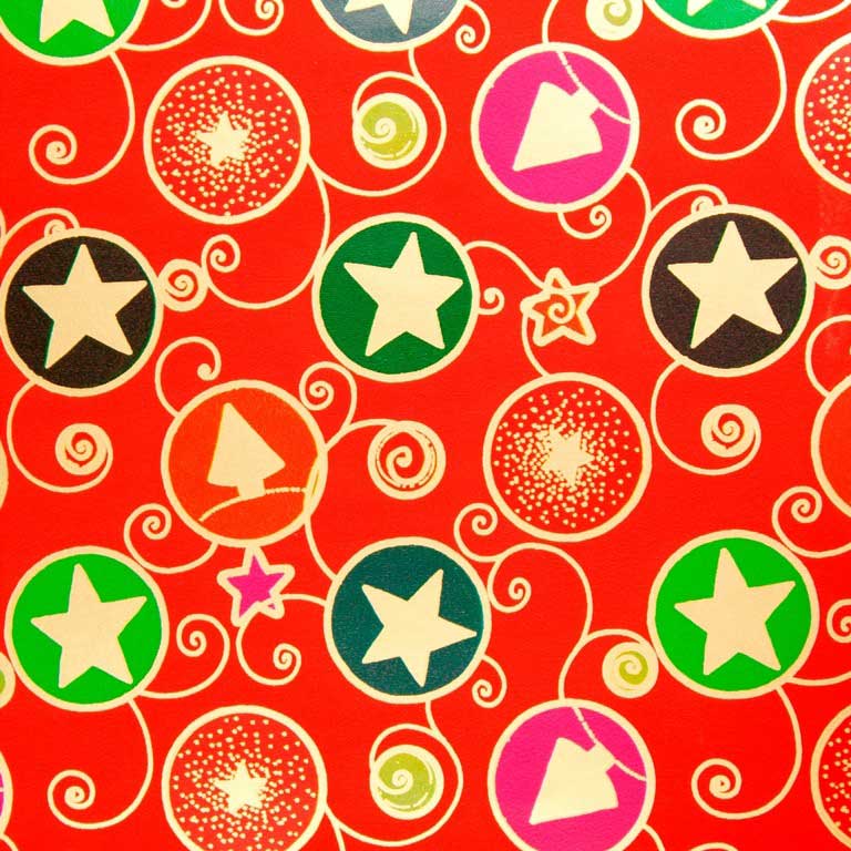Golden christmas stars in colored circles with curls on a red background, glossy strong paper. 
 